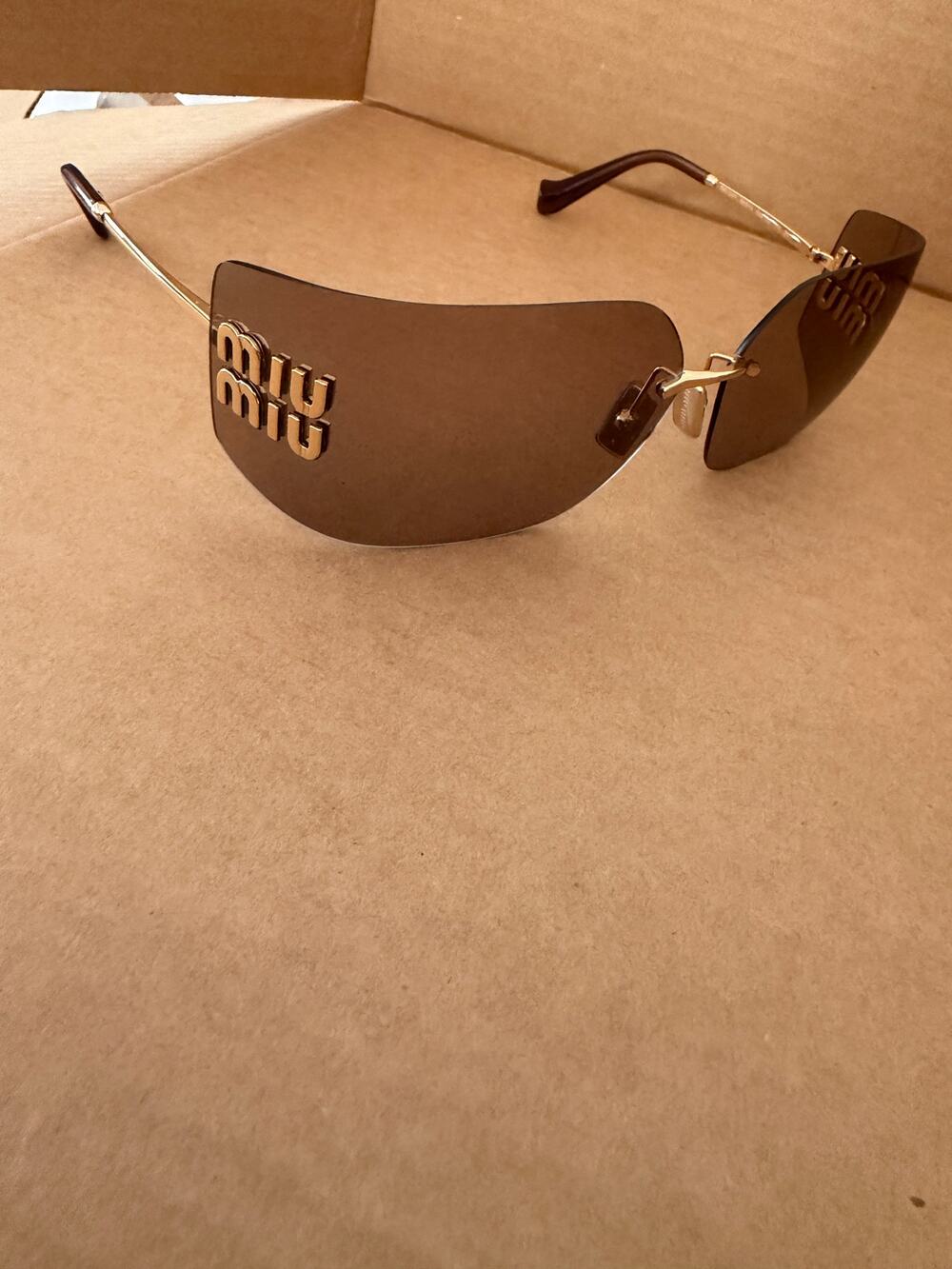 Miu Miu Runway Rimless Sunglasses Mauve Brown